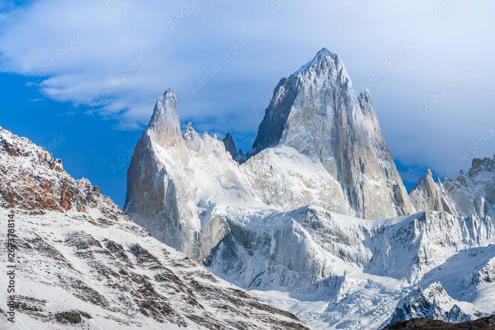 Beautiful close up view of Fitz roy mountains with white snow peak in sunny blue sky day in autumn, El Chalten, south Patagonia, Argentina