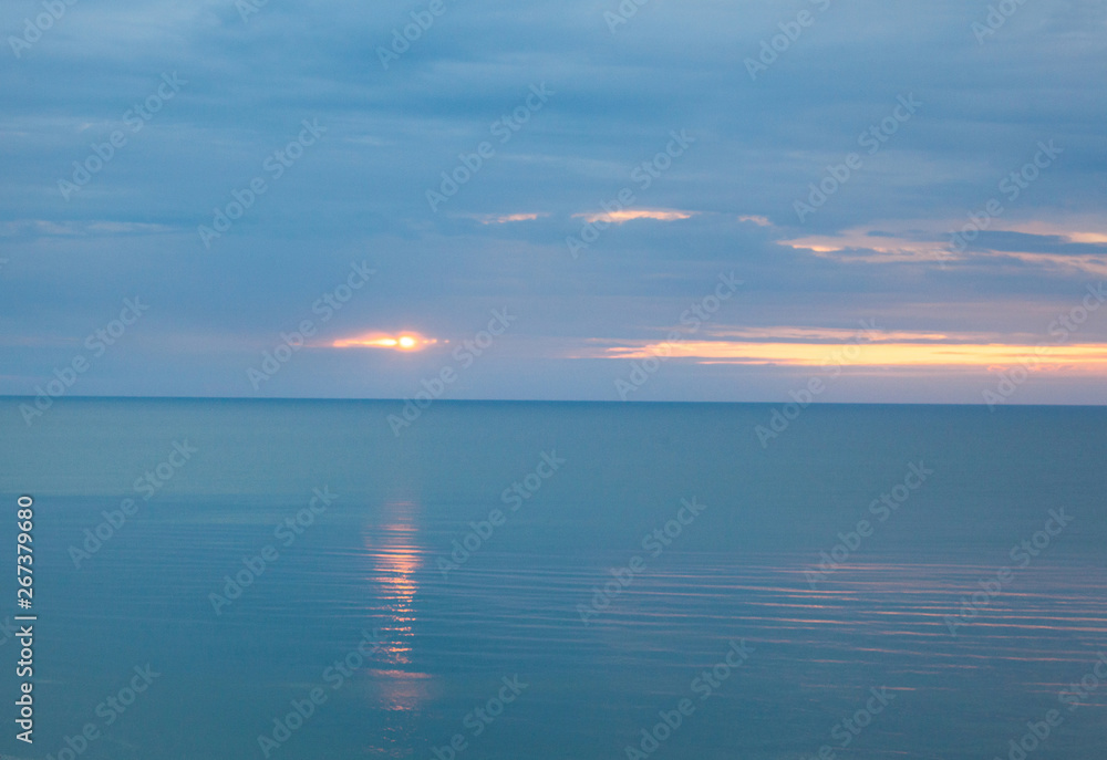 Fototapeta premium Calm sea in a cloudy morning