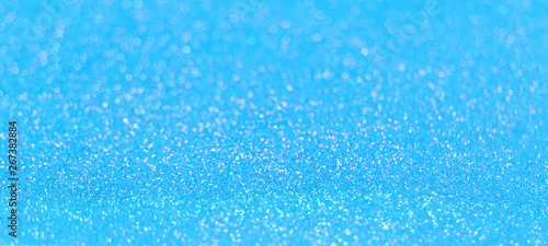 Blue glitter shiny texture background for christmas, Celebration concept. © Touchr