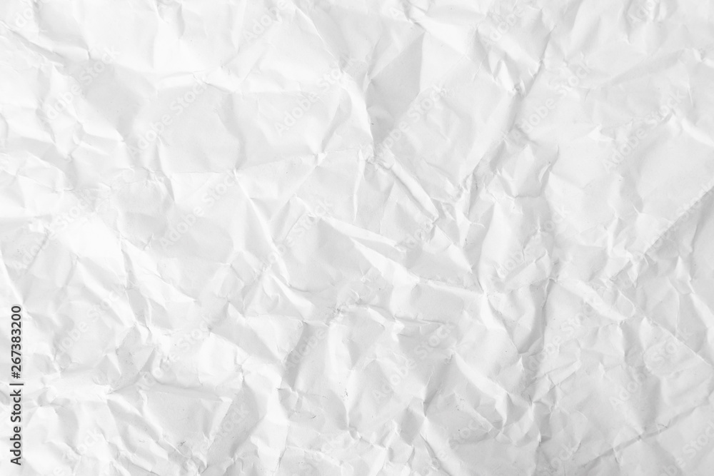 Obraz premium White crumpled paper texture background.
