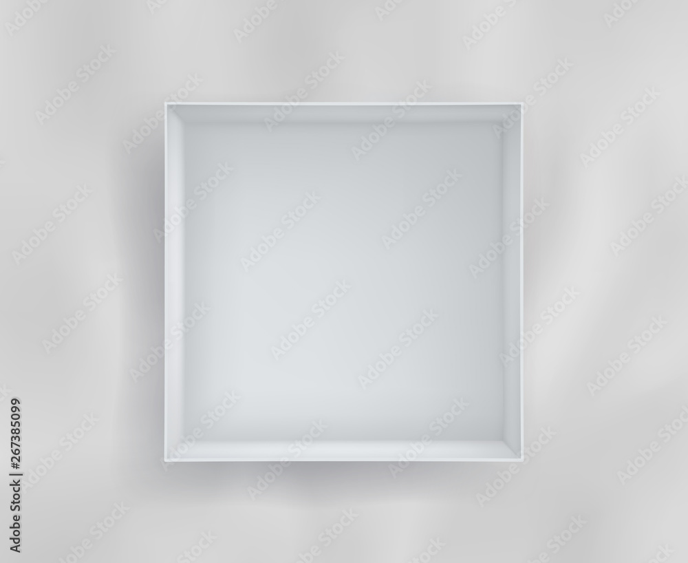 Empty white cardboard box sitting on wrinkled fabric. Mockup for product display Empty white cardboard box sitting on wrinkled fabric. Mockup for product display