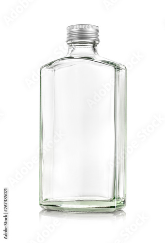 Clear glass whiskey bottle isolated on white background