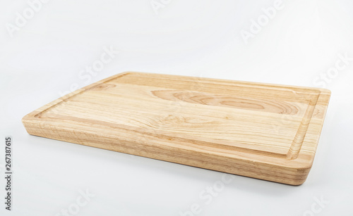 a wooden chopping board on a white background