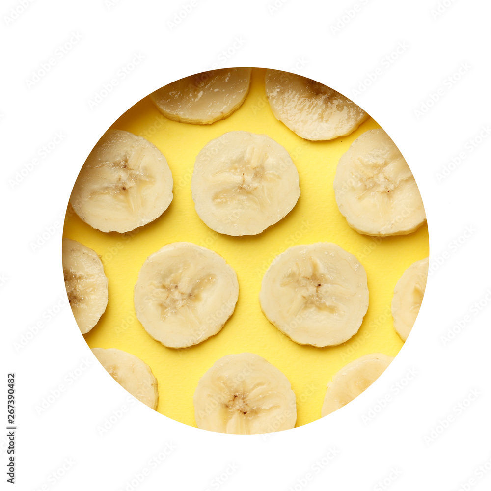 Creative summer pattern made of bananas slice on pastel yellow background. with frame . Fruit minimal concept. Flat lay. Creative summer pattern made of bananas slice on pastel yellow background. with frame . Fruit minimal concept. Flat lay.