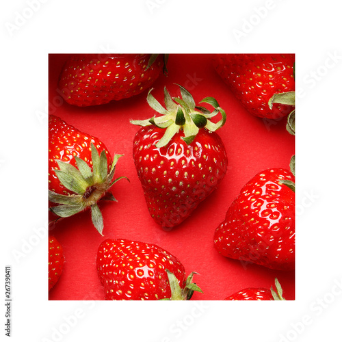 Creative summer pattern made of strawberries on bright red background. with frame . Fruit minimal concept. Flat lay. space for text. Abstract.