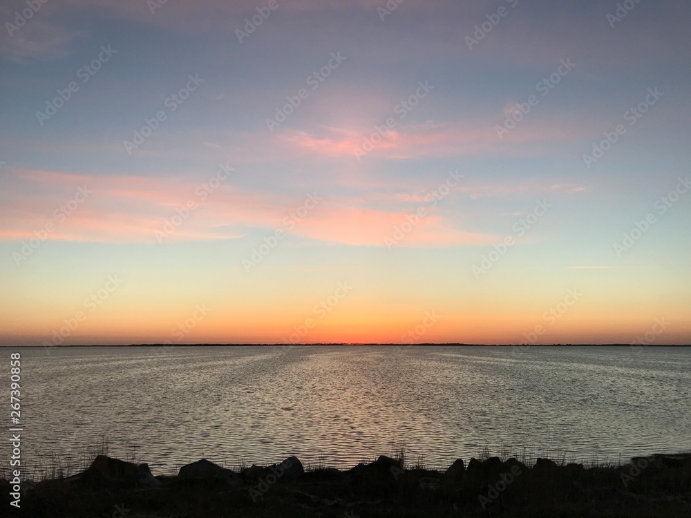 sunset over the sea - coastline of the island rügen