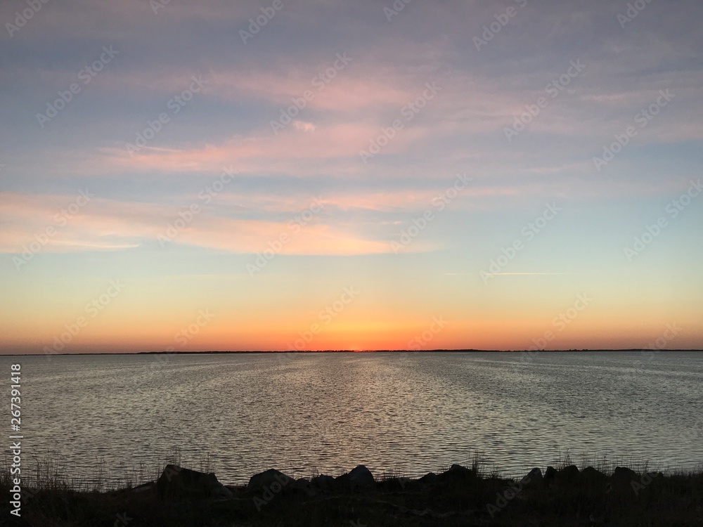 Obraz premium sunset over the sea - coastline of the island rügen
