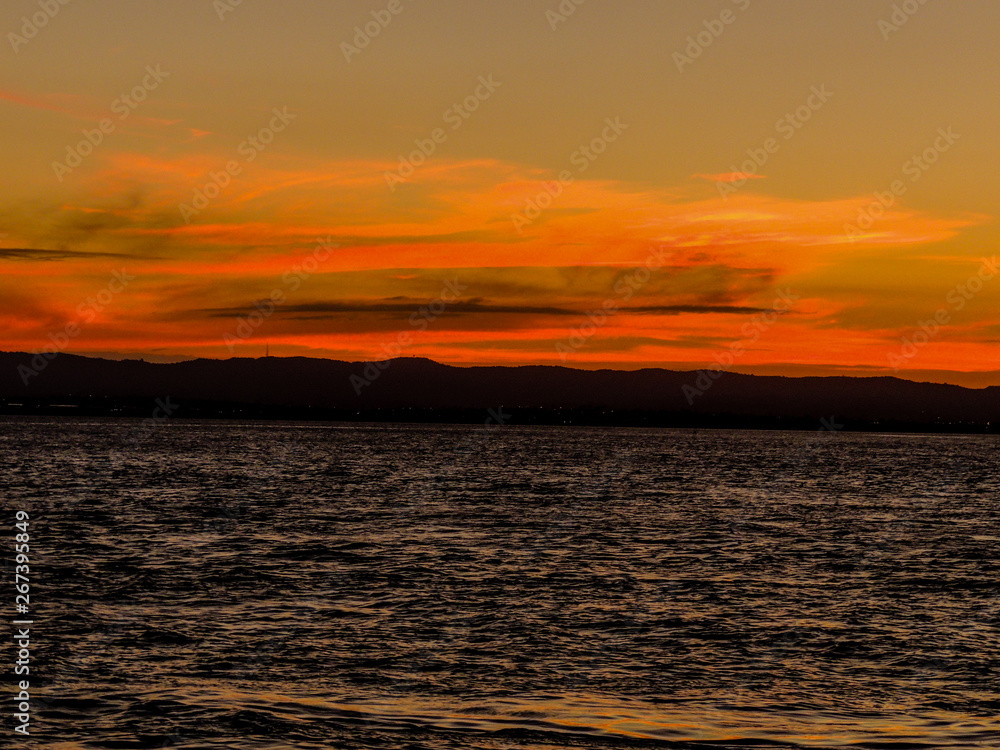 Sunset over the harbour, from the Birkenhead Whard, Waitemata Harbour, Auckland, New Zealand