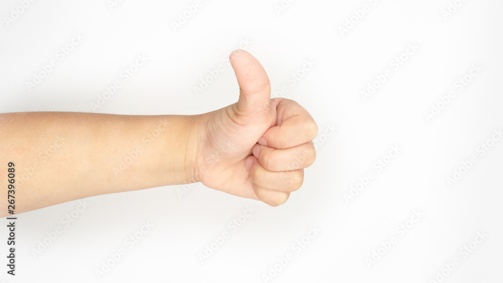 thumbs up child hand thumbing with white background. thumbs up child hand thumbing with white background.