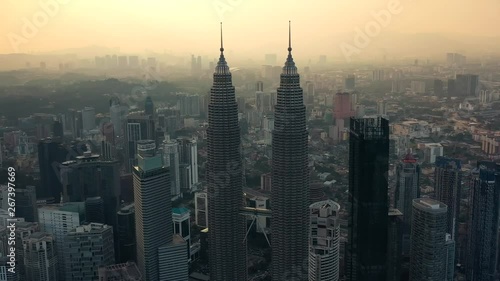 Drone Aerial view 4k Footage of Kuala Lumpur city skyline on sunset in Malaysia.