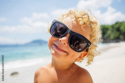  boy are playing on the beach