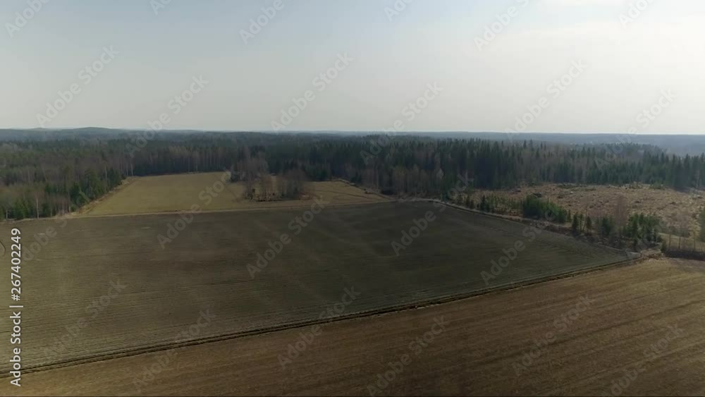 Aerial Drone Shot. Flying Above the Forest and Fields Aerial Drone Shot. Flying Above the Forest and Fields