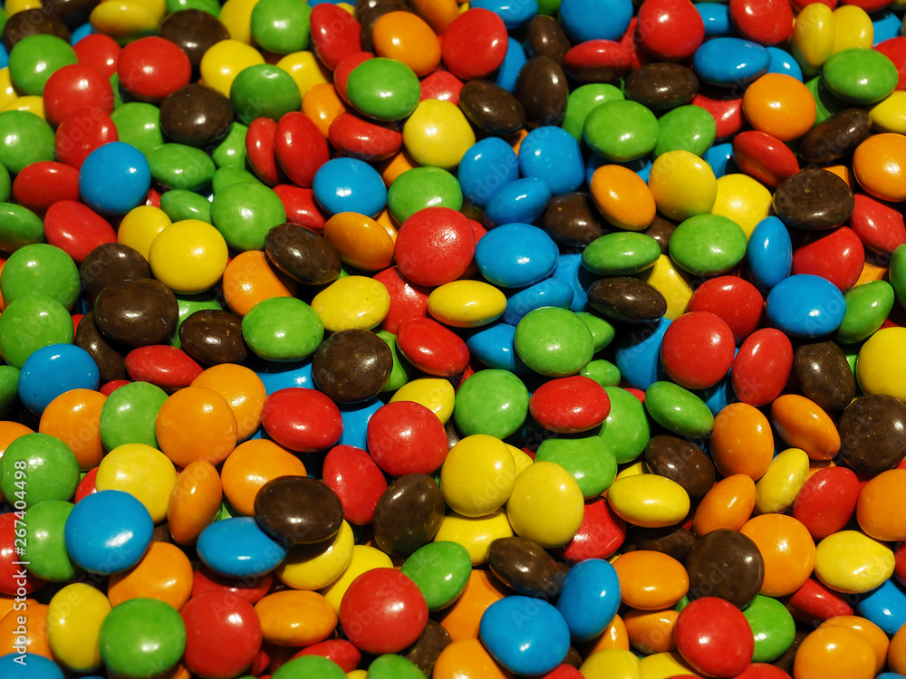 Lot of colorful chocolate drops Lot of colorful chocolate drops