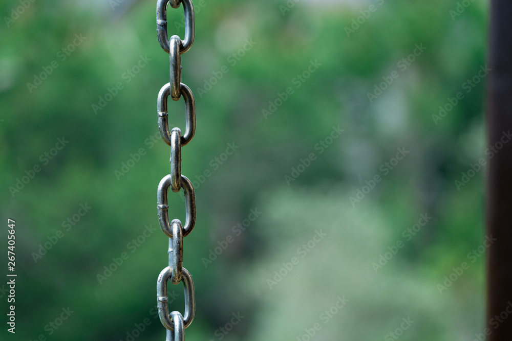 metal chain on green background metal chain on green background