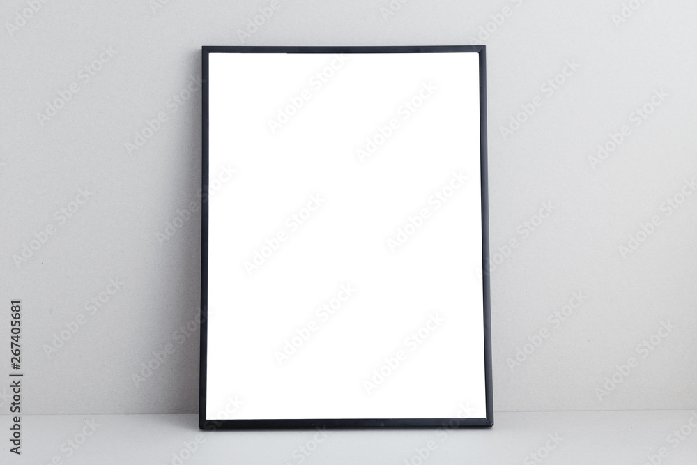 Black empty poster frame on gray neutral background, Black empty poster frame on gray neutral background,