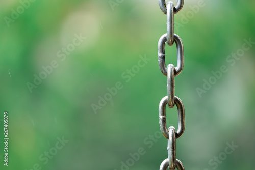 metal chain on green background