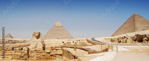 Panorama view of Giza in Cairo, the great pyramyd of Cheops, the pyramids of Kefren and Micerinos, the Sphinx