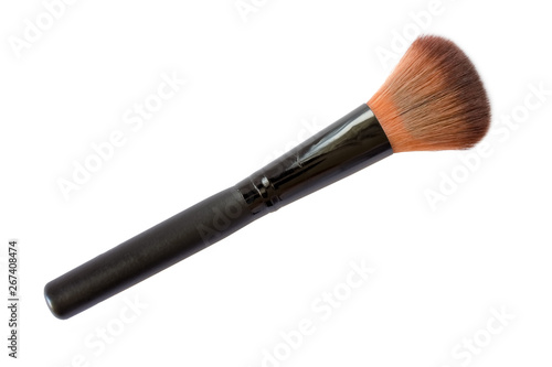 Orange makeup brush on white background