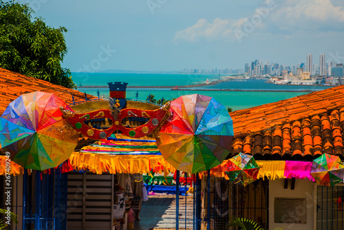 Olinda, Brazil: A view of the Handicraft's Market in Olinda's historic center, cityscape of Recife in the background photo