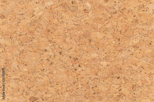 Abstract brown corkboard or cockboard texture background. Natural wood surface for material design element. Beige cork board wallpaper photo