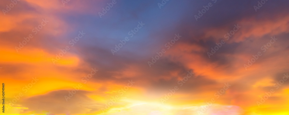 Summer sky blur golden hour sky background hot sunset twilight with cloud and blurry warm bright lights skyline for evening sunset