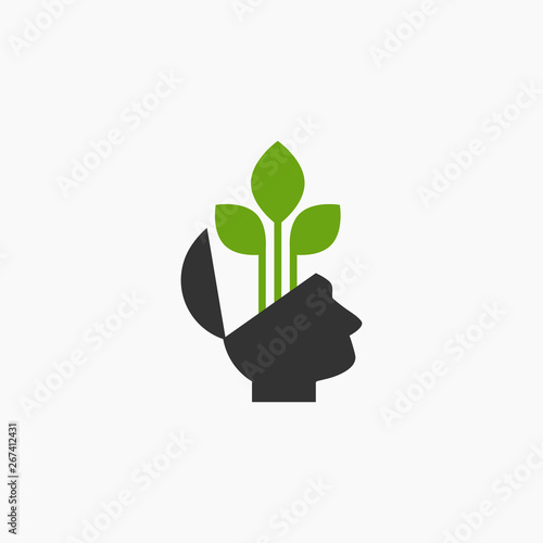 Silhouette of open head with green twigs. Ecology thinking pictogram.