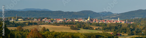 Colorful panorama of Bystrzyca Klodzka on the background of a mountain range.