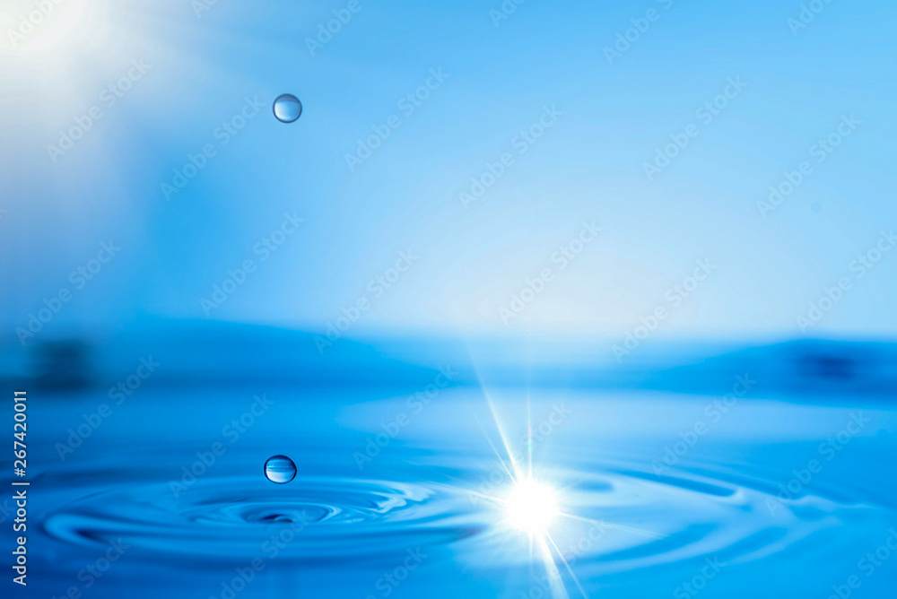 Water drop splash on water surface. Water drop splash on water surface.