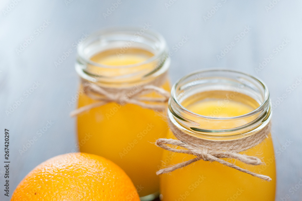 Rustic style orange juice side view Rustic style orange juice side view