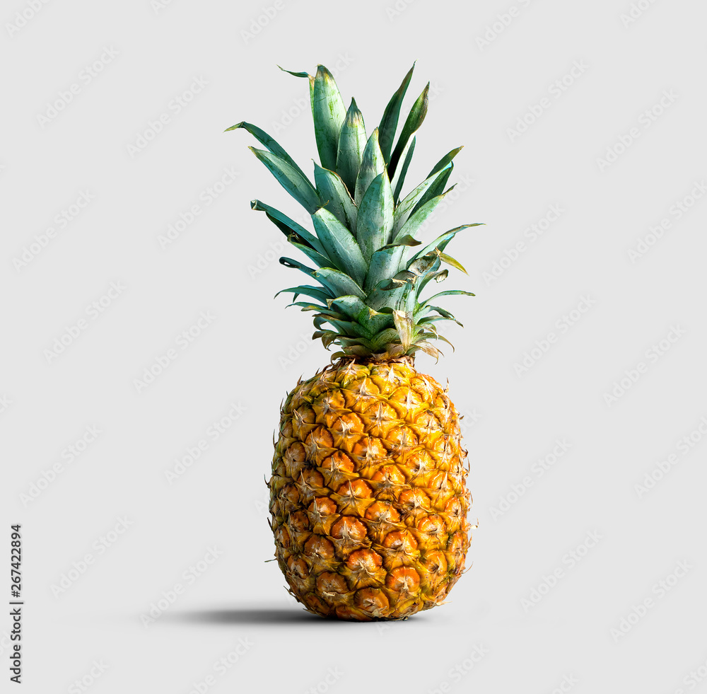 Fototapeta premium One pineapple on a solid color background