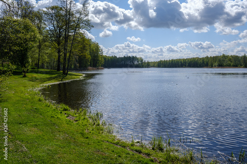 Fototapeta Naklejka Na Ścianę i Meble -  recreation camping area by the blue lake in sunny summer day