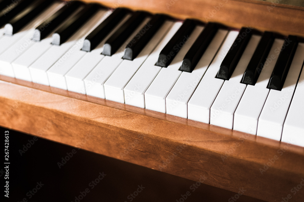 Rustic piano: close up picture of classical piano keys, selective focus Rustic piano: close up picture of classical piano keys, selective focus