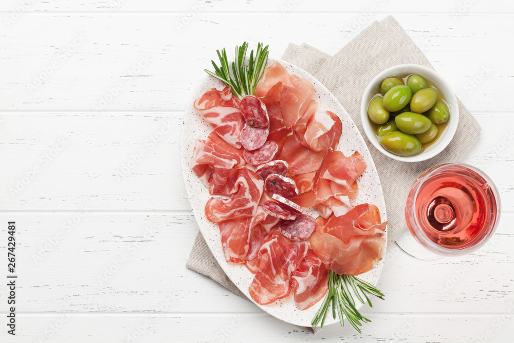 Spanish jamon, prosciutto crudo ham, italian salami Spanish jamon, prosciutto crudo ham, italian salami
