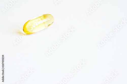 Omega 3 fish oil capsules. Concept of healthcare. Copy space.