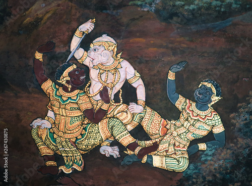Bangkok, Thailand - May 12, 2019: The Ramakian (Ramayana) mural paintings along the galleries of the Temple of the Emerald Buddha, grand palace or wat phra kaew Bangkok Thailand