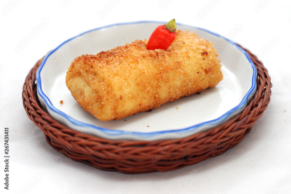 Fried brown mayonnaise cake with a long, coarse-textured shape