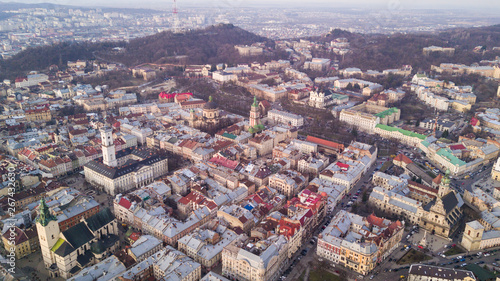 Rooftops of the old town in Lviv in Ukraine during the day. The magical atmosphere of the European city. Landmark, the city hall and the main square. Aerial view.