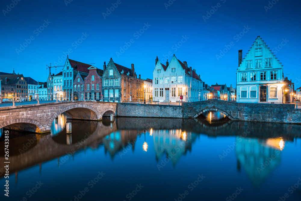 Historic Brugge city center with buildings at canal at twilight, Flanders, Belgium