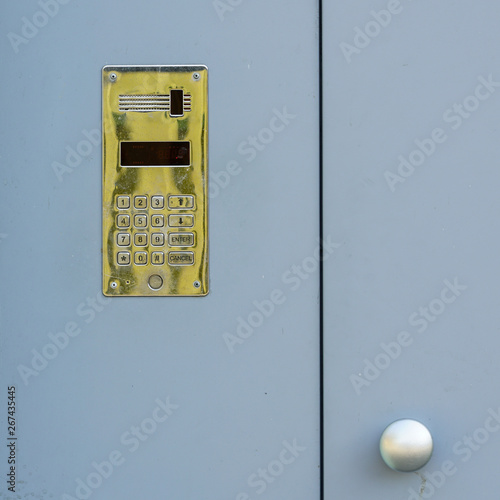 access control door box with numeric keypad on grey background photo