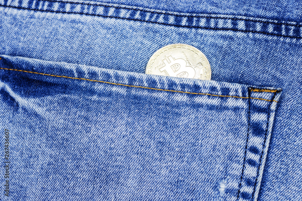 coin cryptocurrency bitcoin in your jeans pocket. bitcoin the most Popular cryptocurrency in the world. Toned image coin cryptocurrency bitcoin in your jeans pocket. bitcoin the most Popular cryptocurrency in the world. Toned image