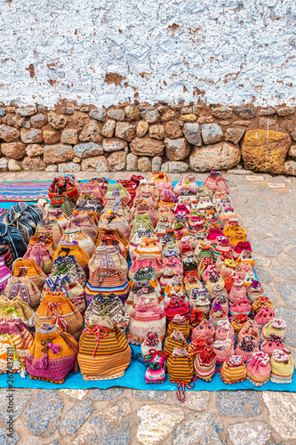 Textile products on sale in Chinchero street of Urubamba Province in Peru.