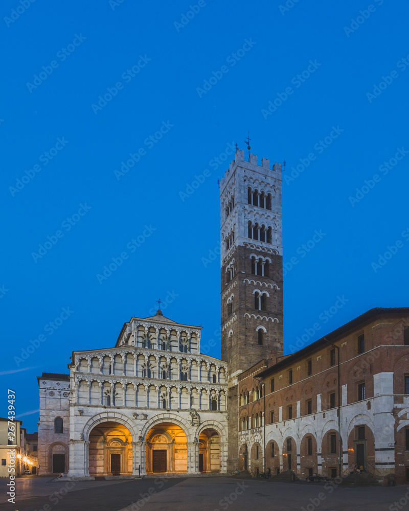 Front facade of St Martin Cathedral and tower in the historic centre of Lucca, Tuscany, Italy