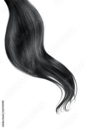 Curl of natural black hair isolated on white background. Long wavy ponytail