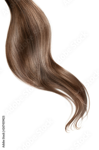 Curl of natural brown hair isolated on white background. Long wavy ponytail
