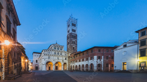 Front facade of St Martin Cathedral and tower in the historic centre of Lucca, Tuscany, Italy