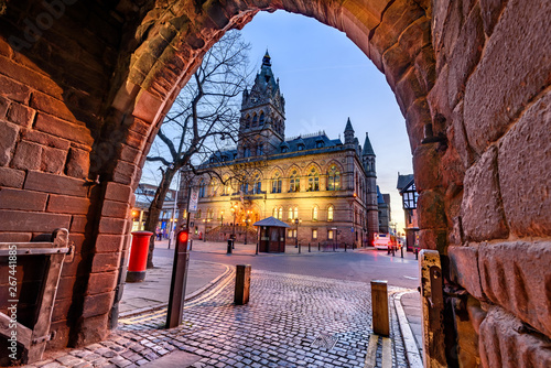 The grey and red sandstone, Gothic style Town Hall with its tower and spire of Chester city, UK. photo