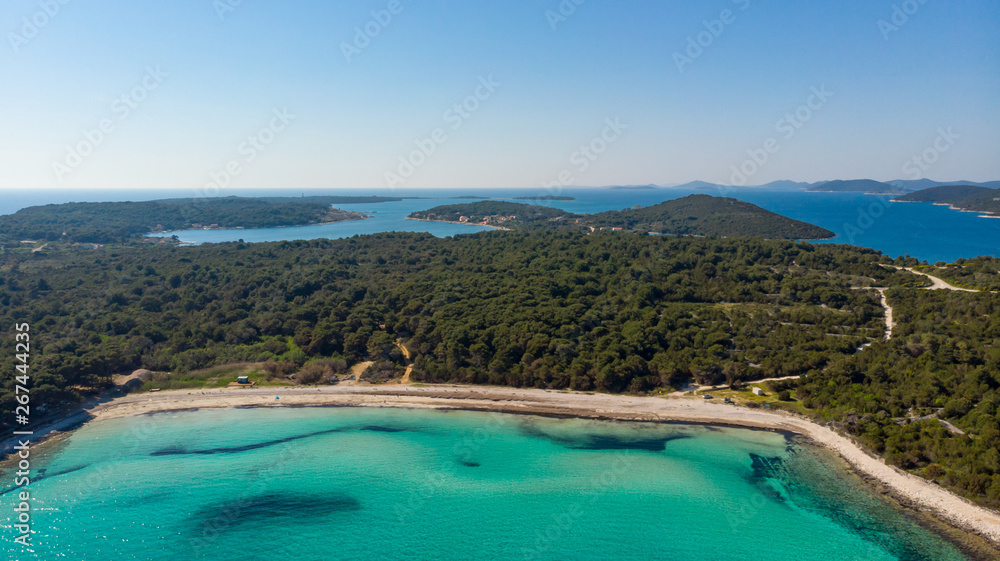 Spectacular aerial sea landscape of sandy coast and crystal clear water.