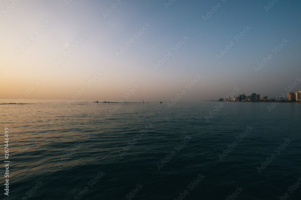 View in the evening of the modern Tel Aviv, Israel and the sea