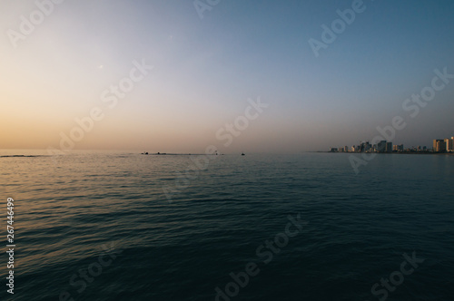 Obraz na płótnie View in the evening of the modern Tel Aviv, Israel and the sea w salonie
