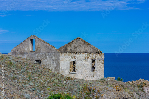 abandoned house by the sea  symmetry  bright colors 